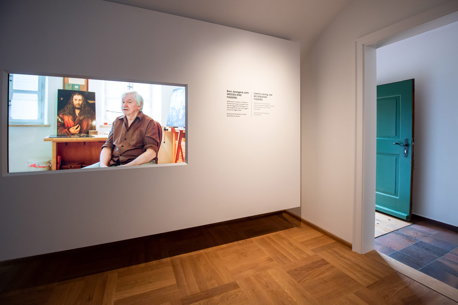 Das Referenzbild für Ausstellungsgestaltung aus der Dauerausstellung Museum der Bewohner zeigt einen Filmsaal